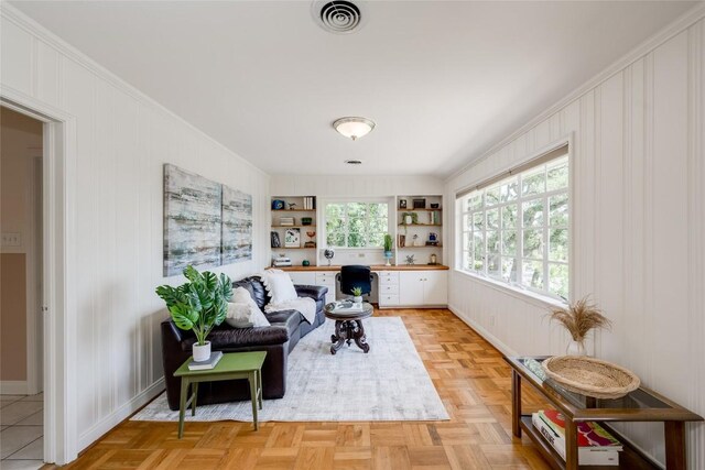 living area with light parquet floors