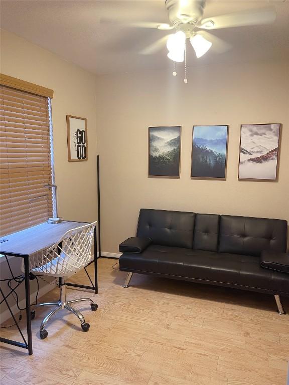 office area featuring ceiling fan and light hardwood / wood-style floors