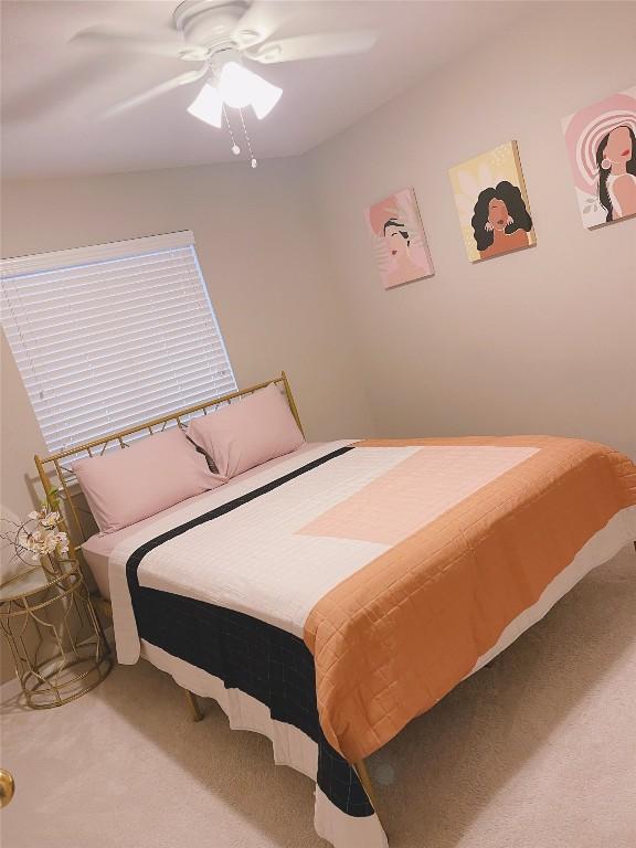 bedroom with carpet floors and ceiling fan