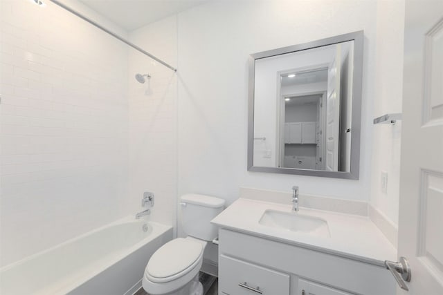 full bathroom with vanity, toilet, and tiled shower / bath