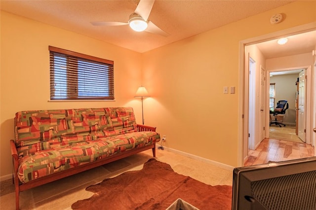 living room with ceiling fan