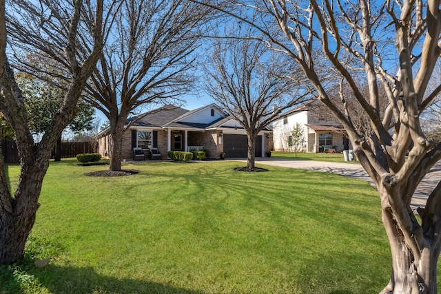 ranch-style home with a garage and a front yard