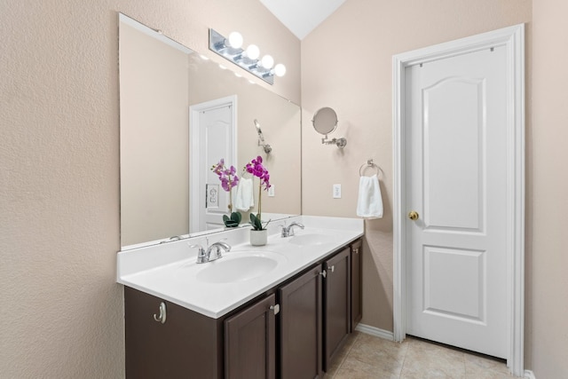 bathroom featuring vanity and tile patterned flooring