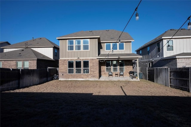 352 Grace Lilly Dr, Buda, TX 78610 - rear view of property featuring a patio and a fenced backyard
