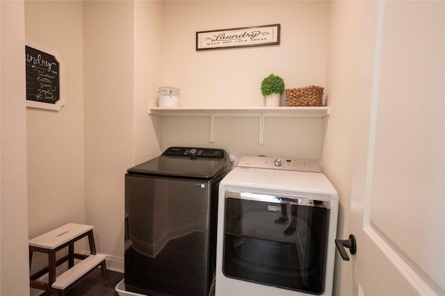 washroom with separate washer and dryer