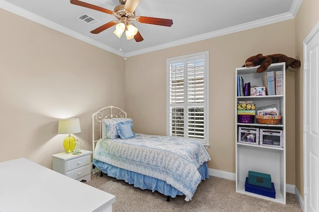 carpeted bedroom with crown molding and ceiling fan