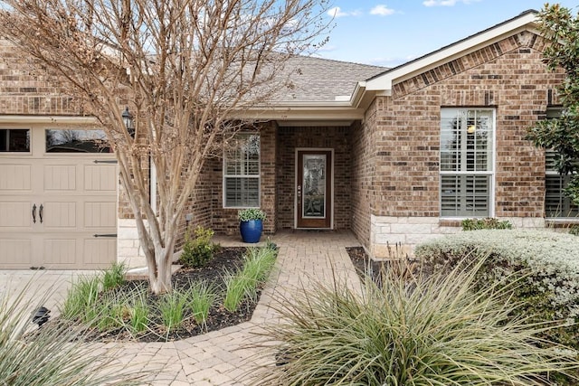 property entrance with a garage