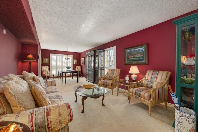 carpeted living room with a textured ceiling