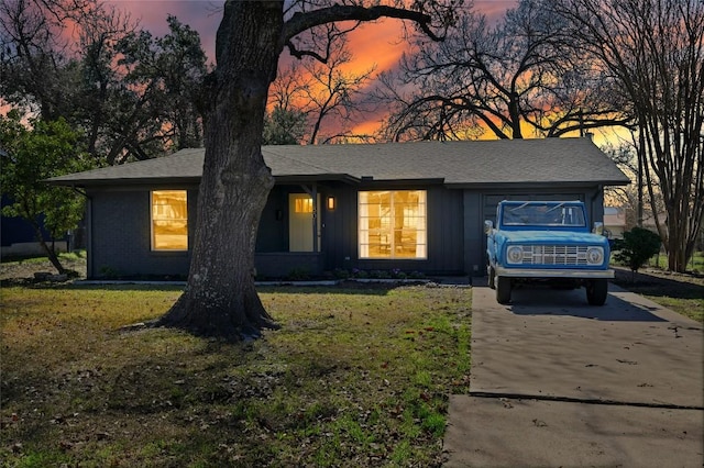 1801 Duke Ave, Austin, TX 78757 - single story home with concrete driveway and a front yard