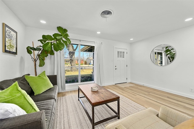 1801 Duke Ave, Austin, TX 78757 - living area with light wood finished floors, recessed lighting, and baseboards