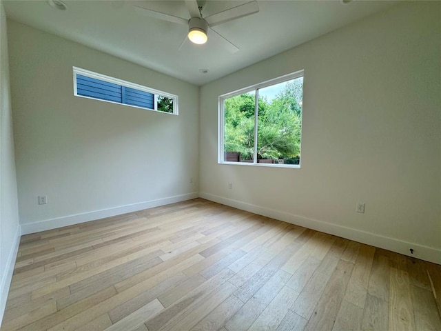1708 Canterbury St Unit 1, Austin, TX 78702 - unfurnished room with baseboards, light wood-style flooring, and a ceiling fan