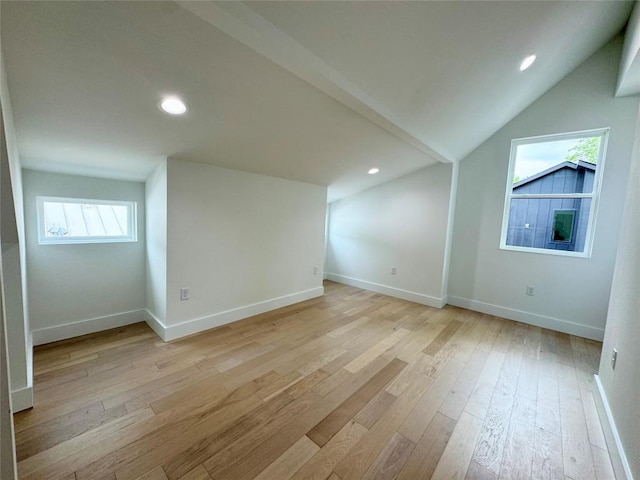 1708 Canterbury St Unit 1, Austin, TX 78702 - additional living space featuring light wood finished floors, lofted ceiling, baseboards, and recessed lighting