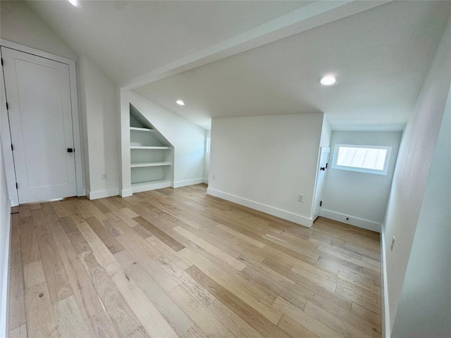 1708 Canterbury St Unit 1, Austin, TX 78702 - bonus room featuring vaulted ceiling, light wood-style floors, baseboards, built in features, and recessed lighting
