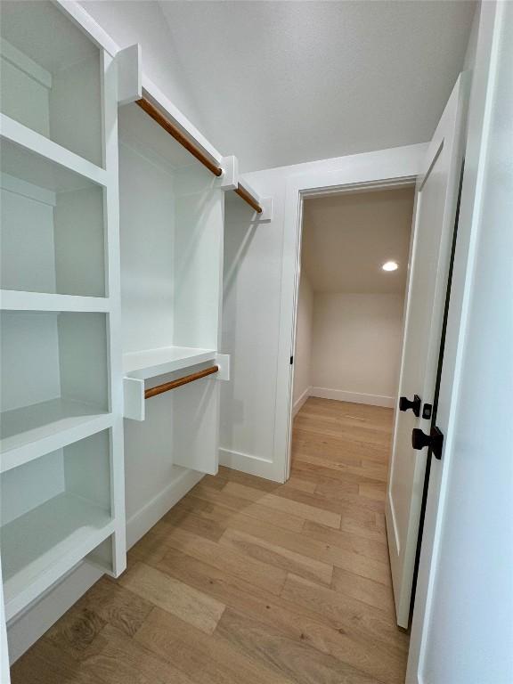 1708 Canterbury St Unit 1, Austin, TX 78702 - walk in closet featuring light wood finished floors