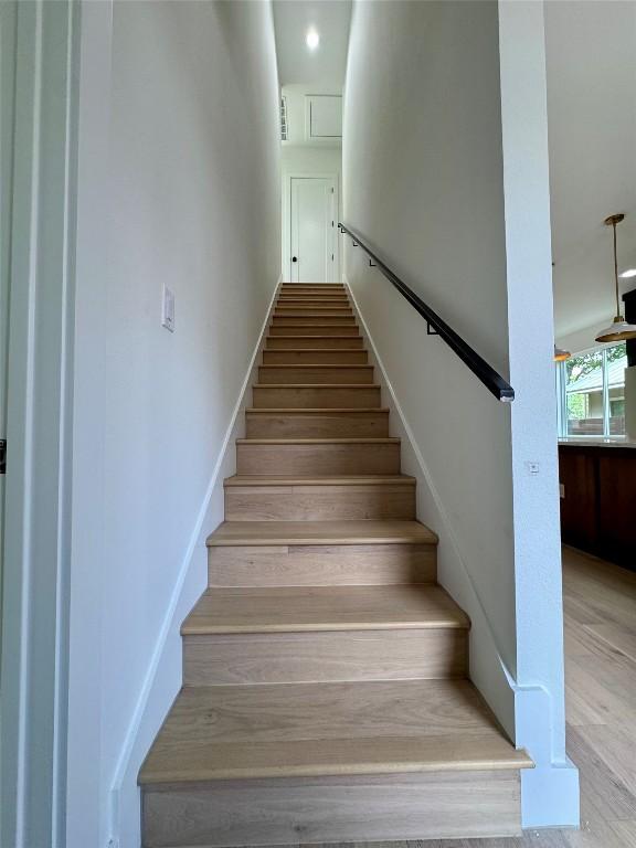 1708 Canterbury St Unit 1, Austin, TX 78702 - stairway with wood finished floors
