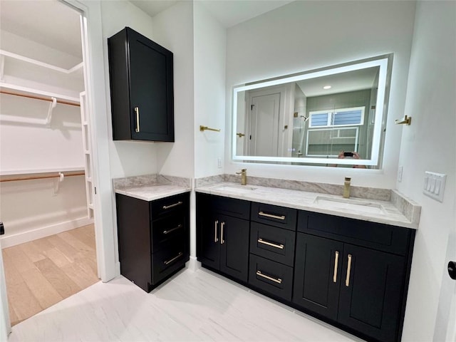 1708 Canterbury St Unit 1, Austin, TX 78702 - full bath featuring double vanity, a stall shower, and a spacious closet