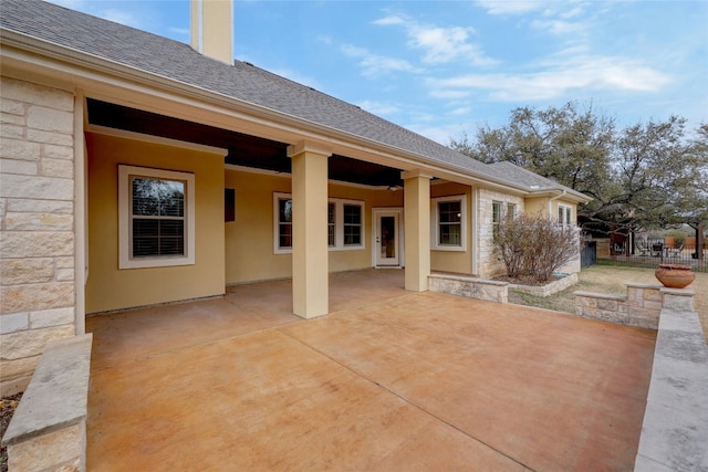 rear view of house featuring a patio