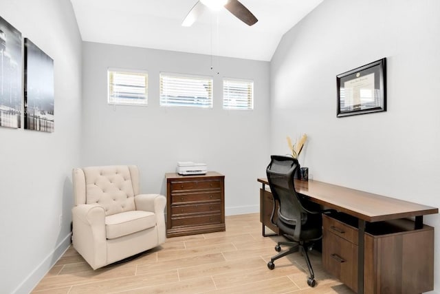 office area featuring a wealth of natural light, ceiling fan, and vaulted ceiling