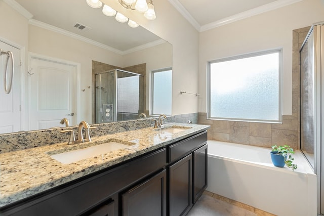 bathroom featuring vanity, tile patterned flooring, crown molding, and plus walk in shower