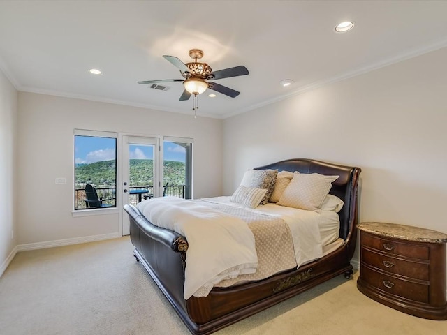 carpeted bedroom with ceiling fan, ornamental molding, and access to exterior