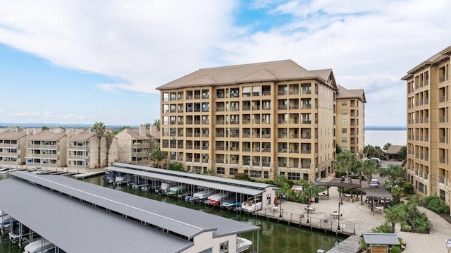 view of building exterior with a water view