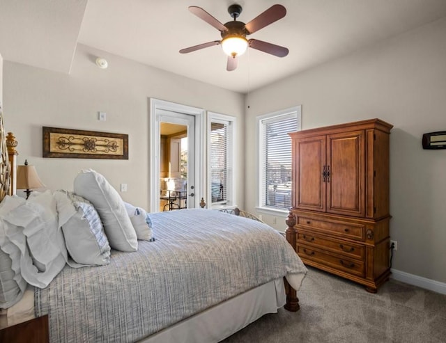 bedroom with ceiling fan and light colored carpet