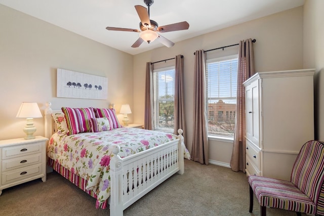 1005 Highknoll Ln, Georgetown, TX 78628 - bedroom with light colored carpet, a ceiling fan, and baseboards