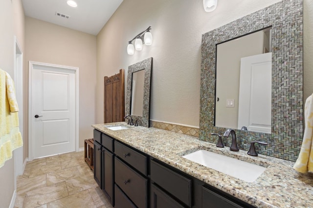 1005 Highknoll Ln, Georgetown, TX 78628 - full bath featuring double vanity and backsplash