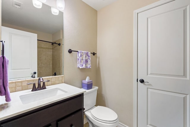 1005 Highknoll Ln, Georgetown, TX 78628 - full bathroom featuring vanity, toilet, decorative backsplash, and a shower