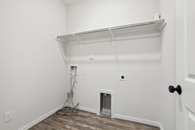 clothes washing area with laundry area, washer hookup, baseboards, dark wood finished floors, and electric dryer hookup