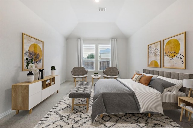 bedroom with lofted ceiling, baseboards, visible vents, and light colored carpet