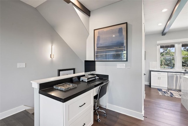 home office with beam ceiling and dark wood-type flooring