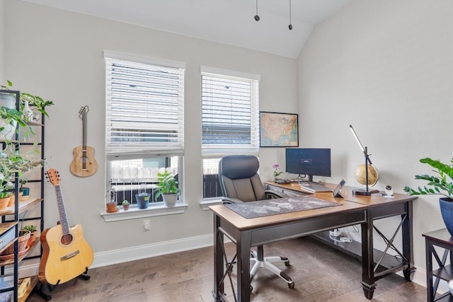 office space with wood-type flooring and lofted ceiling