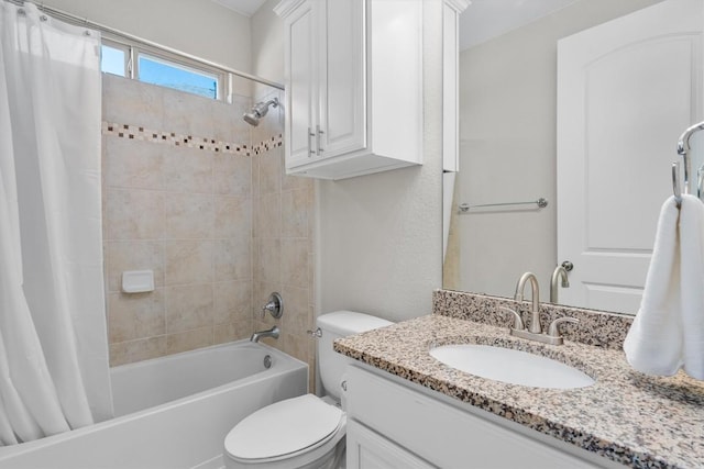 full bathroom featuring shower / bathtub combination with curtain, vanity, and toilet