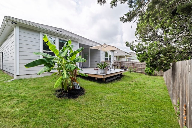 view of yard with a deck