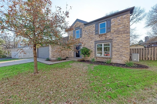 view of front facade with a garage and a front yard