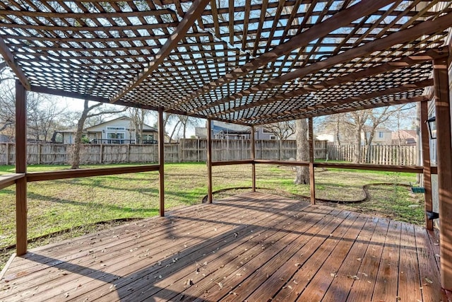 deck featuring a pergola and a lawn