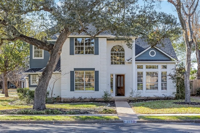 view of front of house with a front lawn