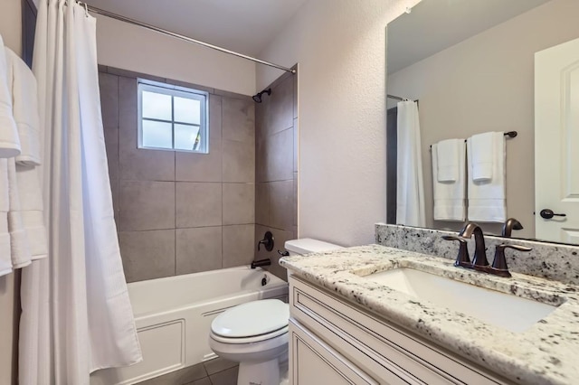 bathroom featuring toilet, tile patterned flooring, shower / bath combo with shower curtain, and vanity