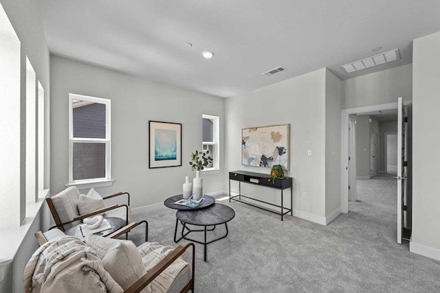 sitting room with light carpet