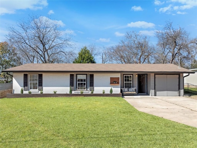 5410 Overbrook Dr, Austin, TX 78723 - single story home featuring an attached garage, brick siding, driveway, and roof with shingles