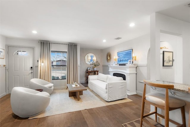 living room with light hardwood / wood-style floors