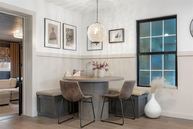 5410 Overbrook Dr, Austin, TX 78723 - dining room featuring wood finished floors and a chandelier