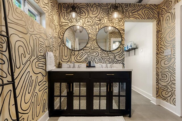 5410 Overbrook Dr, Austin, TX 78723 - bathroom view of wallpapered walls and double vanity