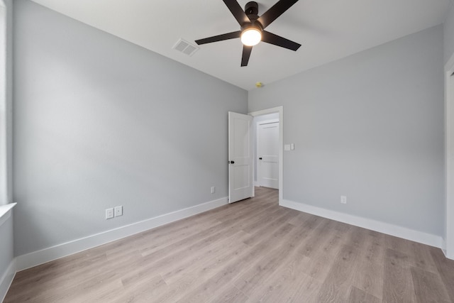 106 Halawa Ct, Bastrop, TX 78602 - empty room with a ceiling fan and light wood-style flooring