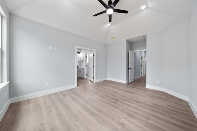 106 Halawa Ct, Bastrop, TX 78602 - unfurnished bedroom with vaulted ceiling, light wood-type flooring, recessed lighting, and ensuite bathroom