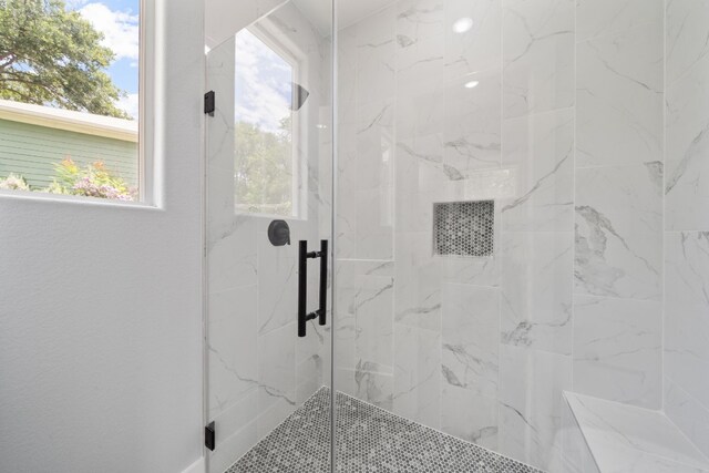 bathroom with an enclosed shower