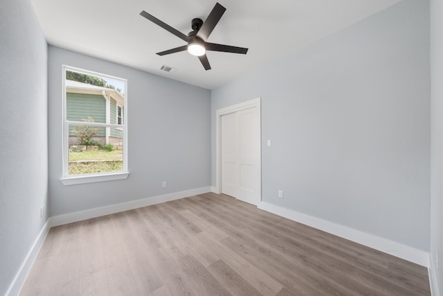 106 Halawa Ct, Bastrop, TX 78602 - spare room with wood finished floors and a ceiling fan