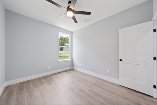 unfurnished room featuring light hardwood / wood-style floors and ceiling fan