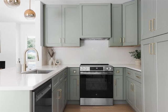 kitchen with black dishwasher, sink, gray cabinetry, hanging light fixtures, and electric stove